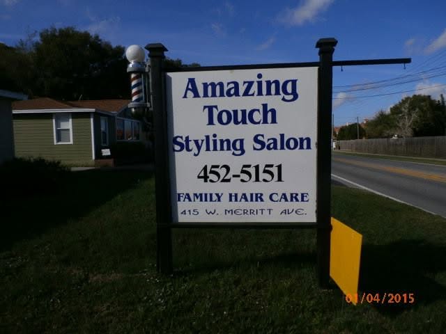 Amazing Touch Styling Salon’s roadside sign, photographed in 2015