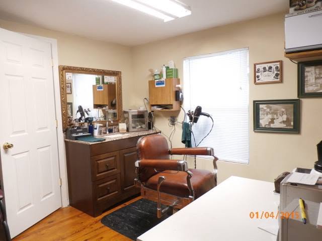 Styling chair in a historical photo from the salon’s 2015 Facebook album