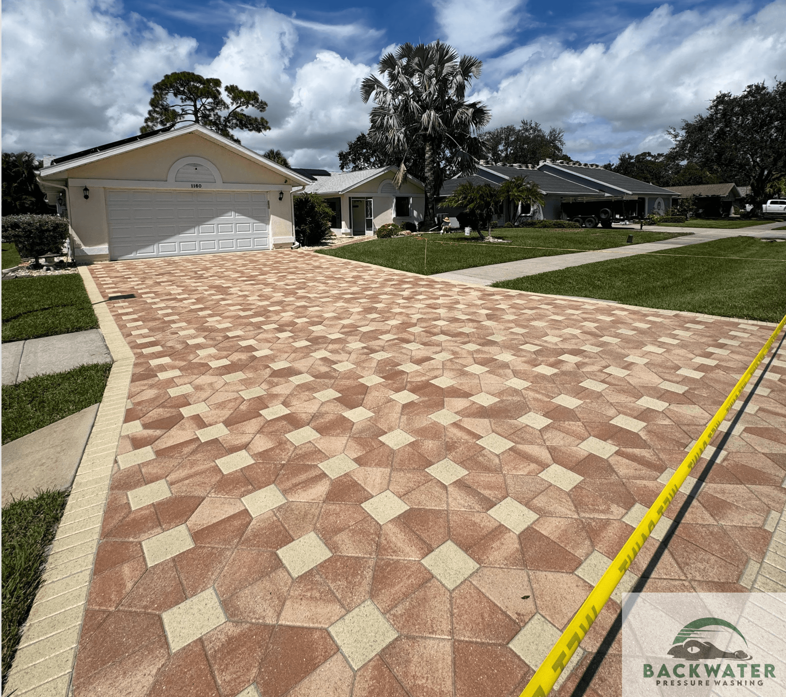 Paver driveway after cleaning and sealing, as shown on Backwater’s website