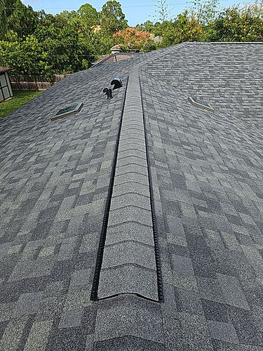 Shingle roofing project shown on JMak’s website